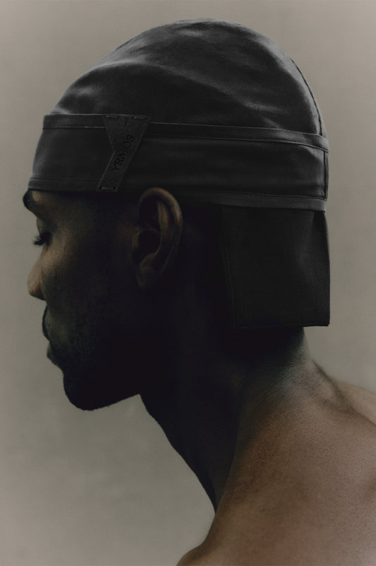 Black YRMOS durag on model, premium hand-tailored London silk, seamless fit and elegant drape, knot-less loop design. - Black