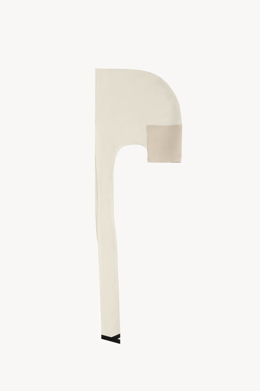 Flat lay of Ivory YRMOS durag, brushed double-layer silk, knot-less loop design, subtle suede details, luxury craftsmanship. - Ivory